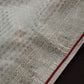 White Saree with Red Saree and a blouse piece