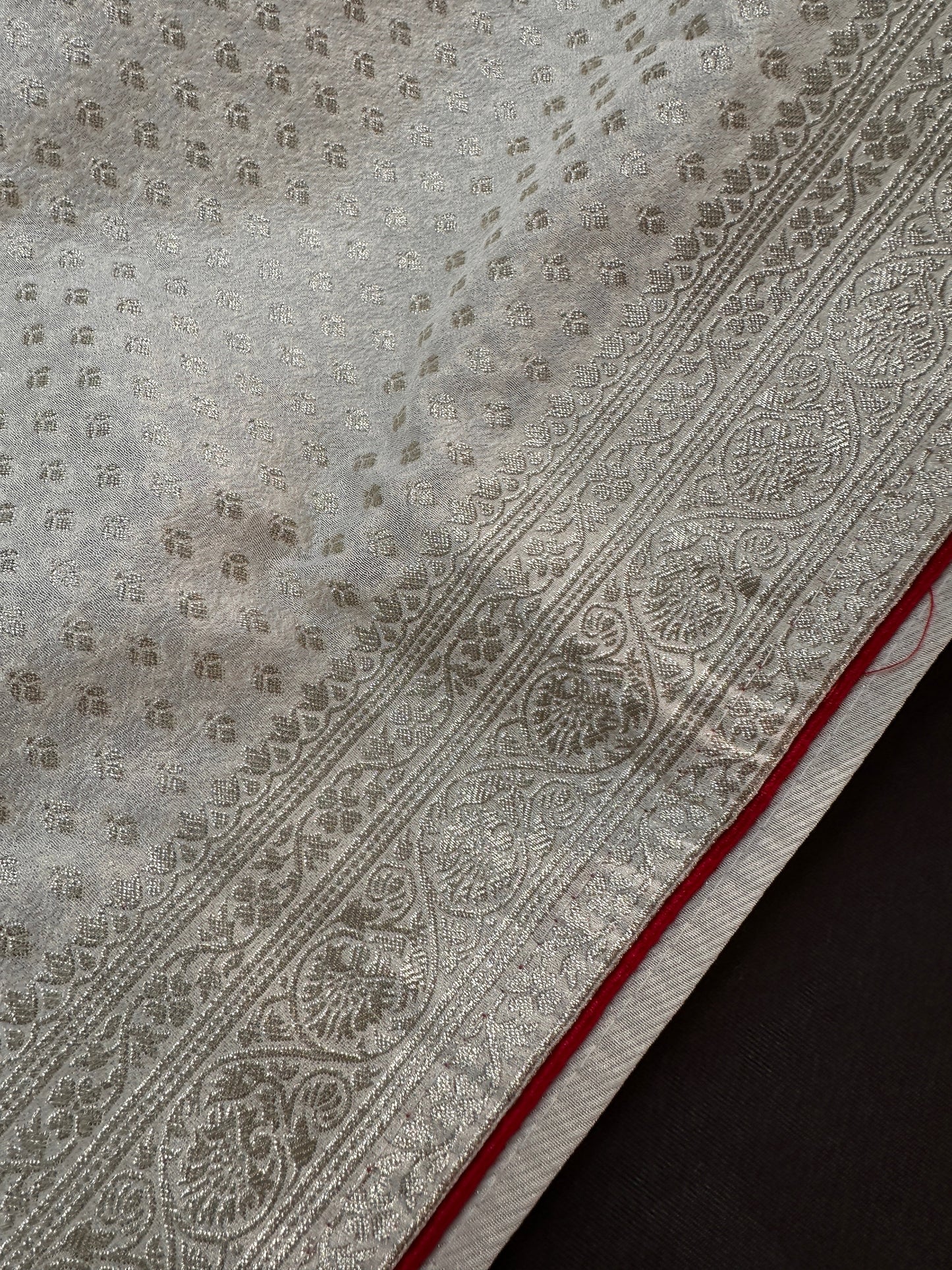 White Saree with Red Saree and a blouse piece
