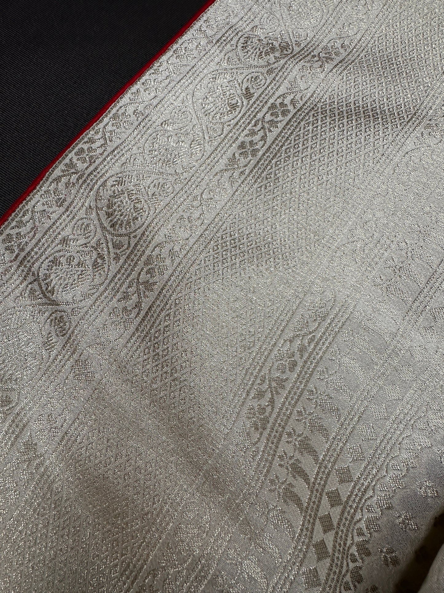White Saree with Red Saree and a blouse piece