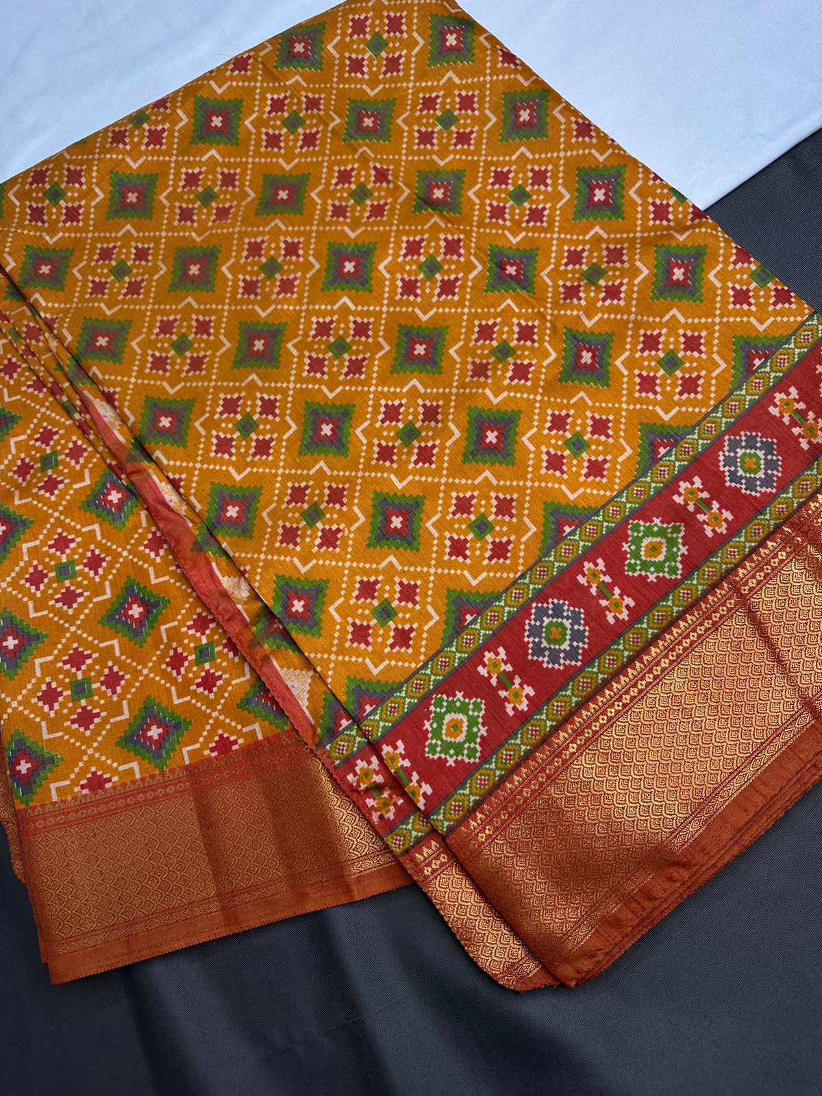 Mustard Orange Patola Ikkat Lightweight Silk Saree - SR001119