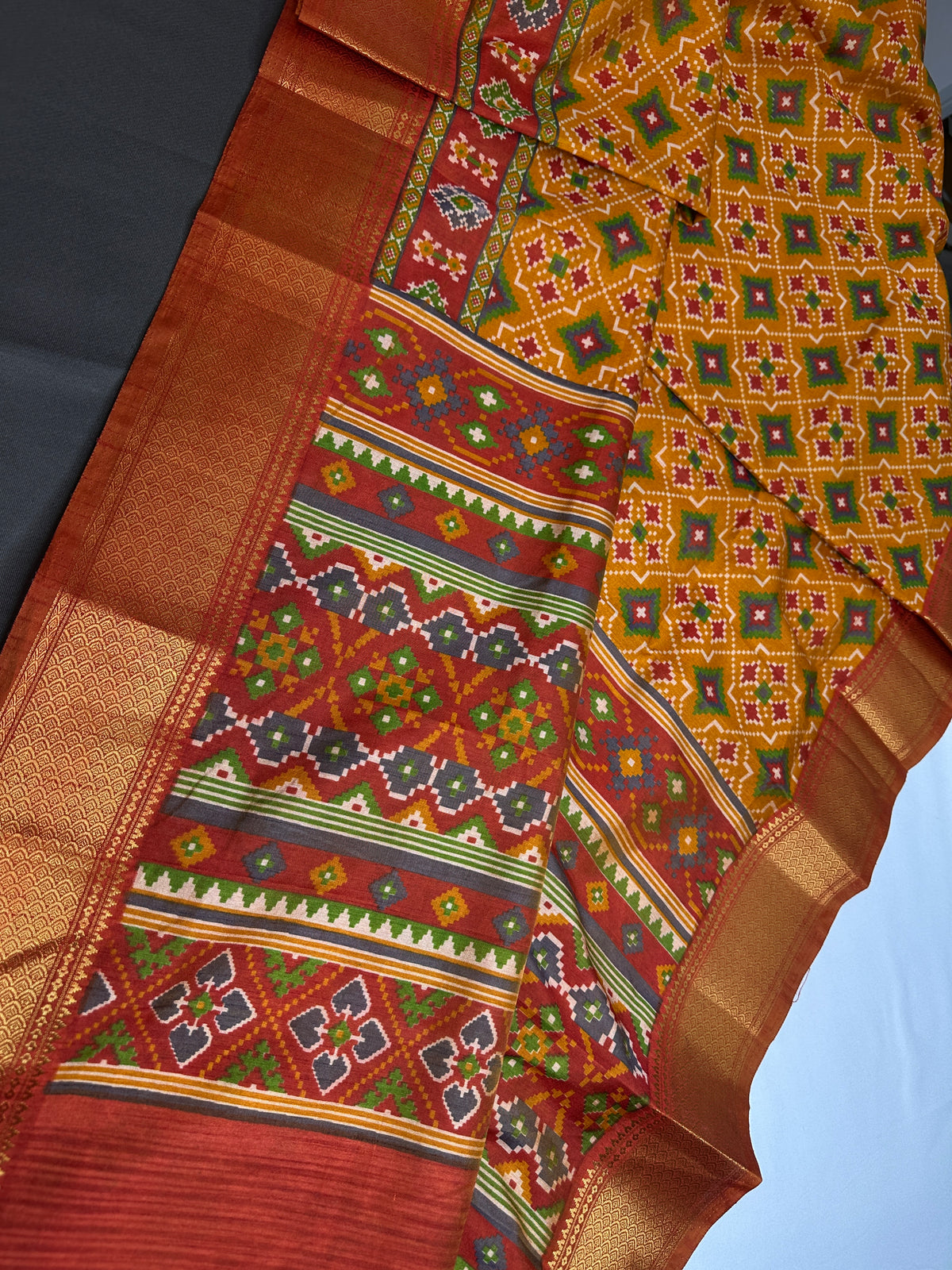 Mustard Orange Patola Ikkat Lightweight Silk Saree - SR001119
