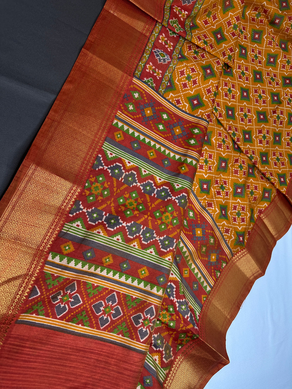 Mustard Orange Patola Ikkat Lightweight Silk Saree - SR001119