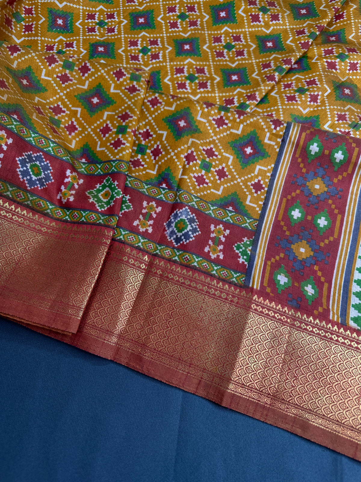 Mustard Orange Patola Ikkat Lightweight Silk Saree - SR001119