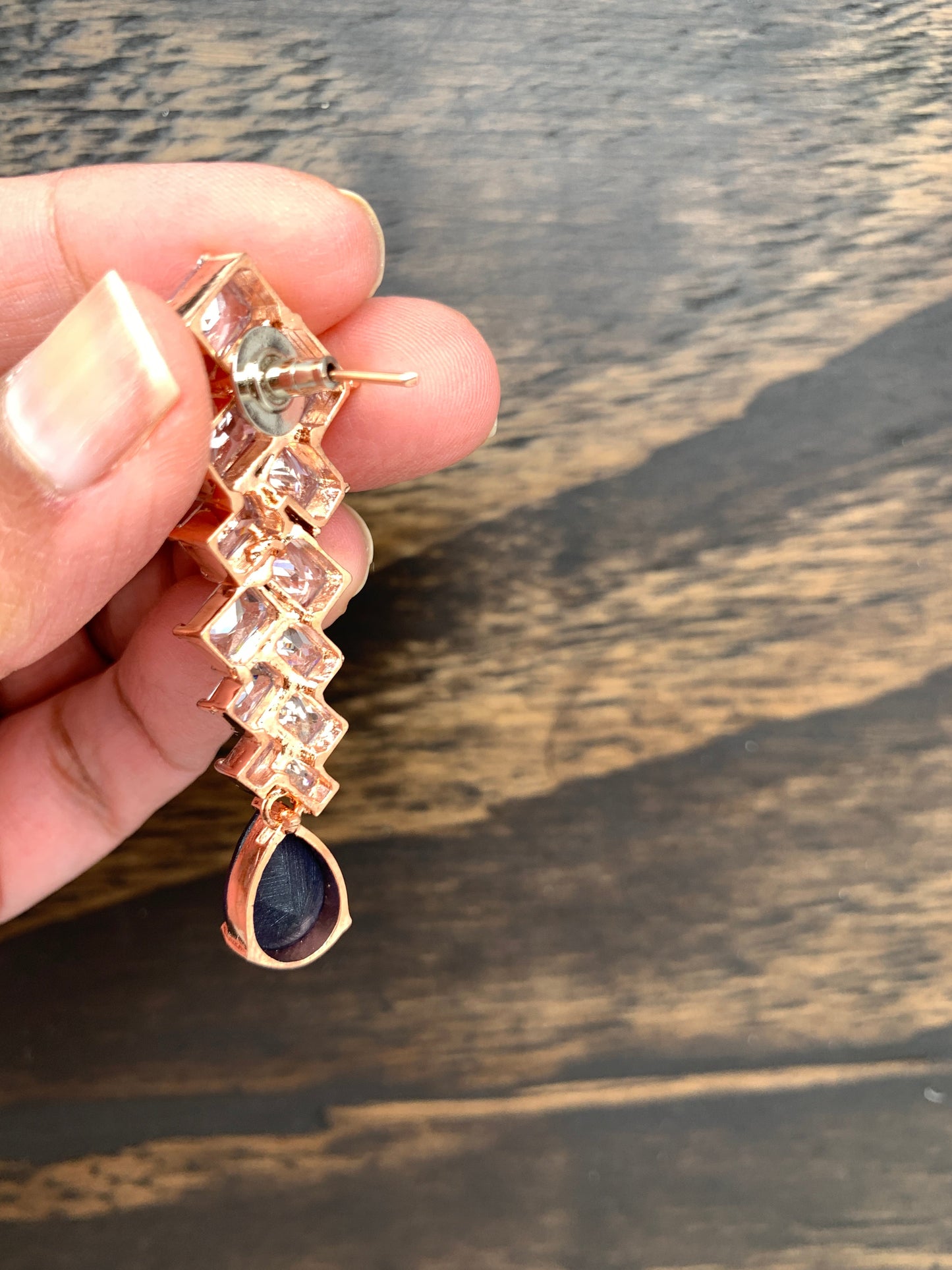 AD Earrings with Blue Stone in Rose Gold Polish