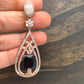 AD Earrings with Blue Stone in Rose Gold Polish