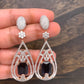 AD Earrings with Blue Stone in Dual Tone Polish