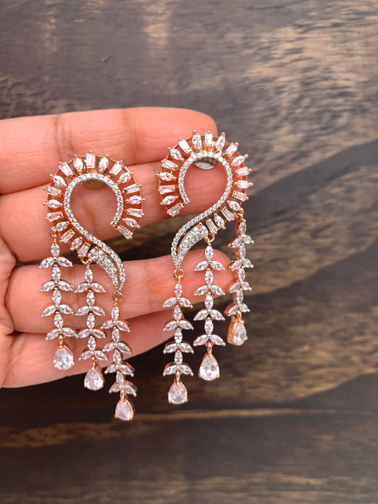 AD Earrings with Clear Stone Danglers in Rose Gold Polish