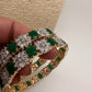 AD Emerald Green Stone Diamond Finish Floral Pattern Bangles