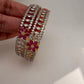 AD Ruby Red Stone Diamond Finish Floral Pattern Bangles