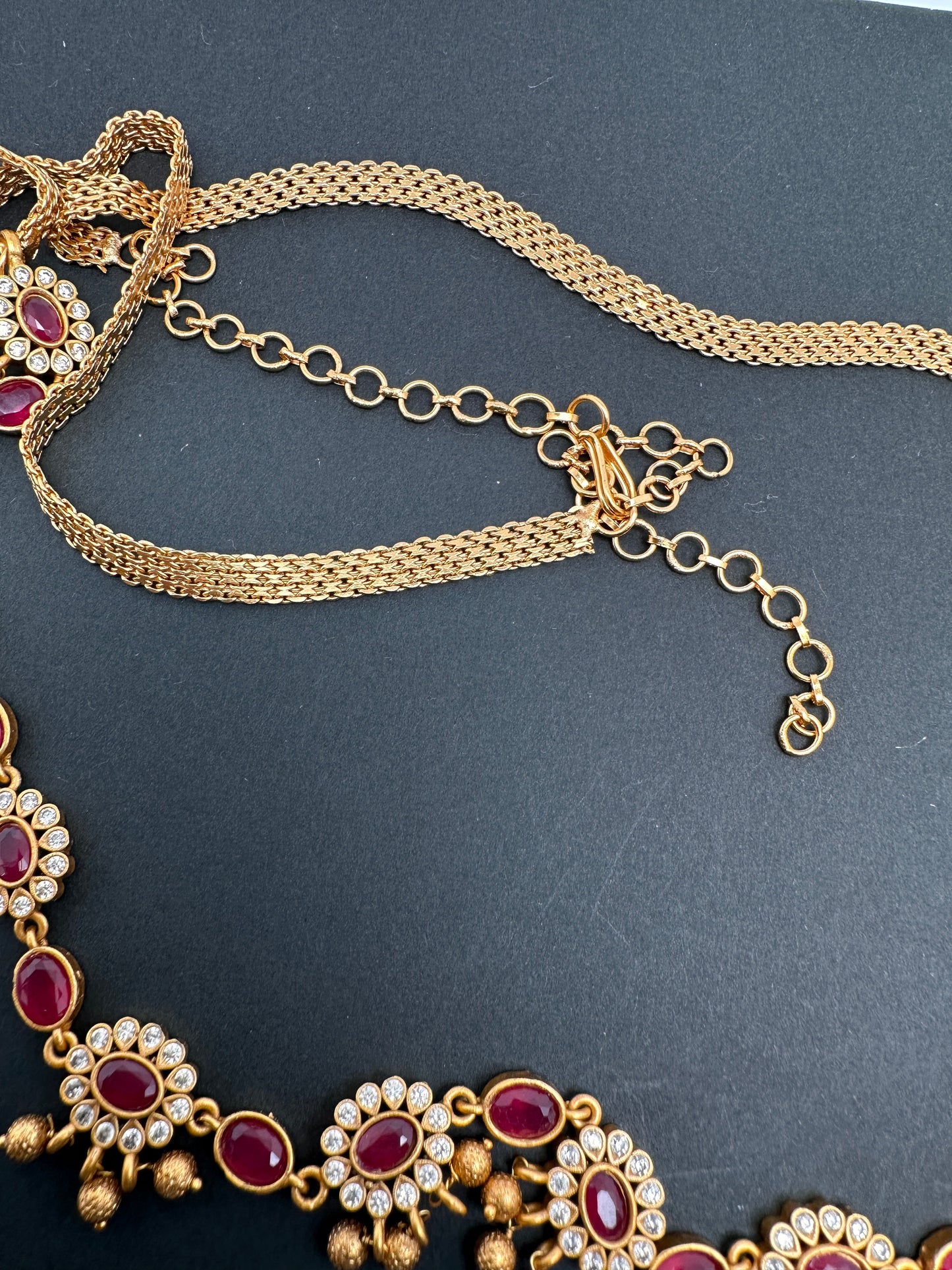 Sleek CZ Red Stone Matte Finish Floral Design Hip Chain Vaddanam