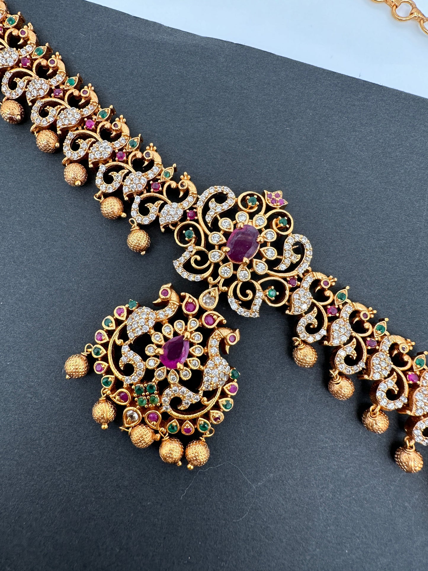 Sleek CZ Red Green Multi Stone Matte Finish Peacock Design Hip Chain Vaddanam