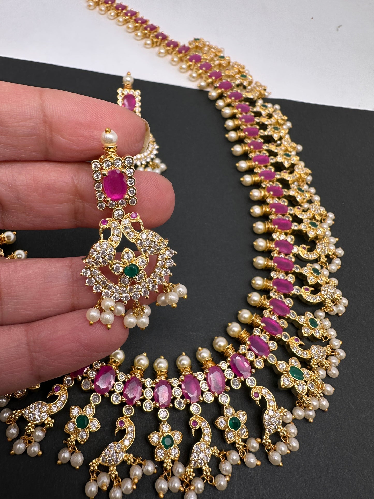 AD Ruby Red Stone Peacock Design Golden Finish Long Necklace