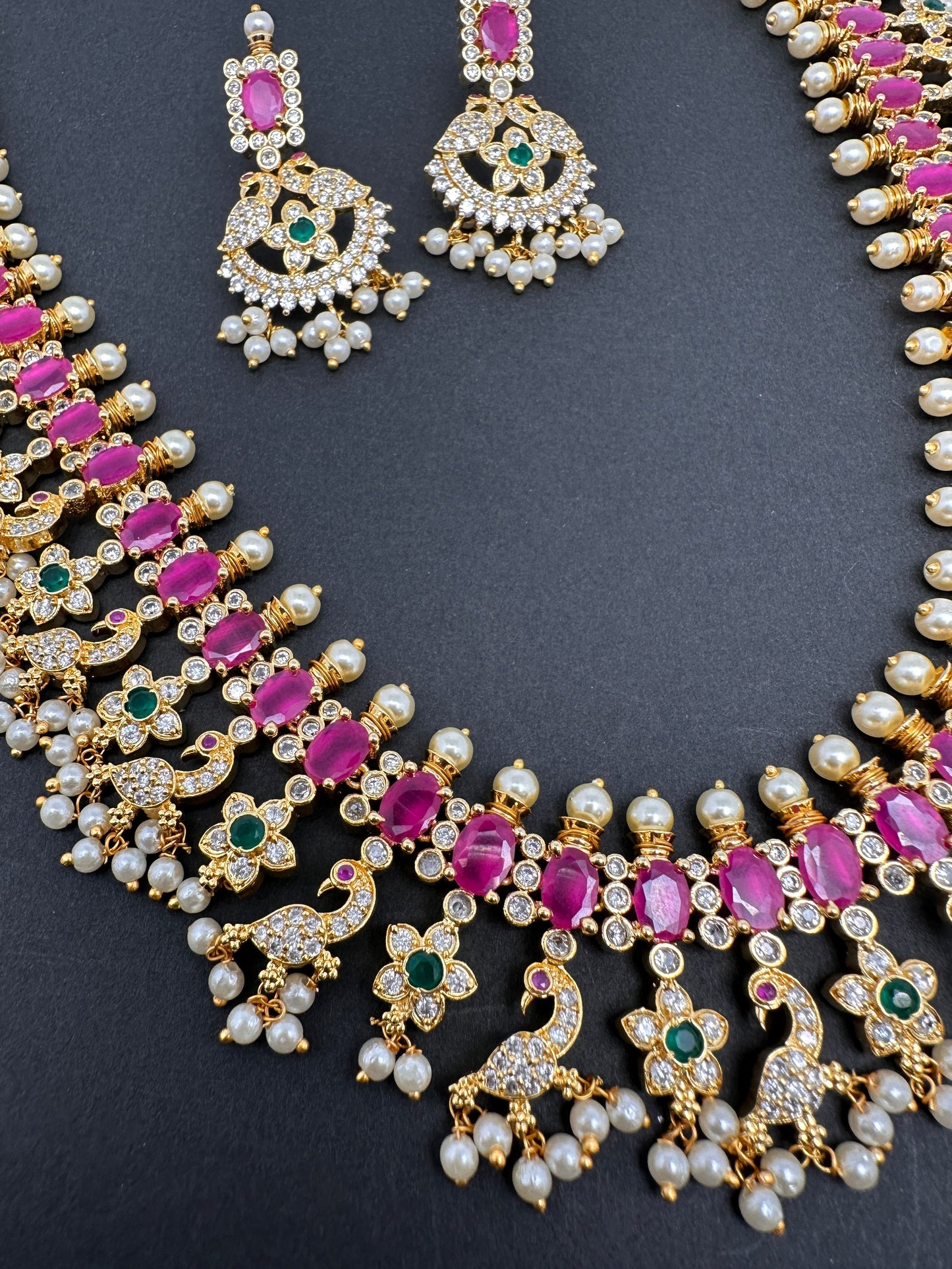 AD Ruby Red Stone Peacock Design Golden Finish Long Necklace