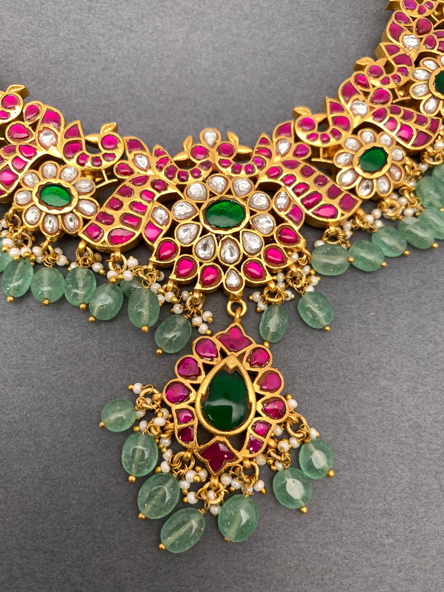 Red Jadau Kundan Emerald Green Stone Emerald Beads Neckline Necklace