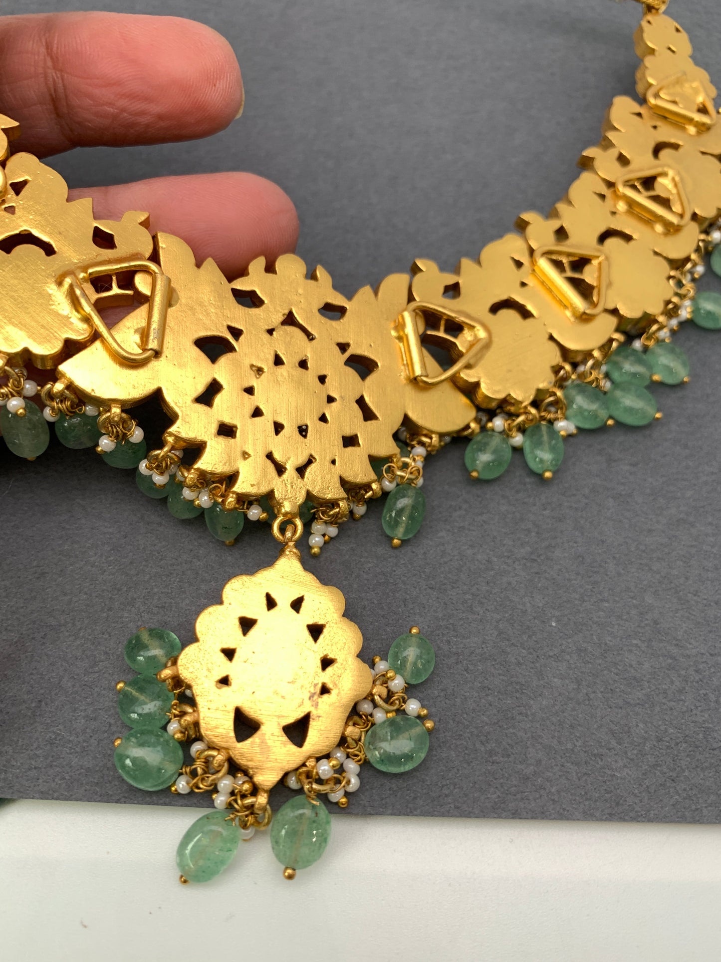Red Jadau Kundan Emerald Green Stone Emerald Beads Neckline Necklace
