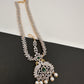 Diamond FinishPeacock Maangteeka Mathapatti with Red Stone