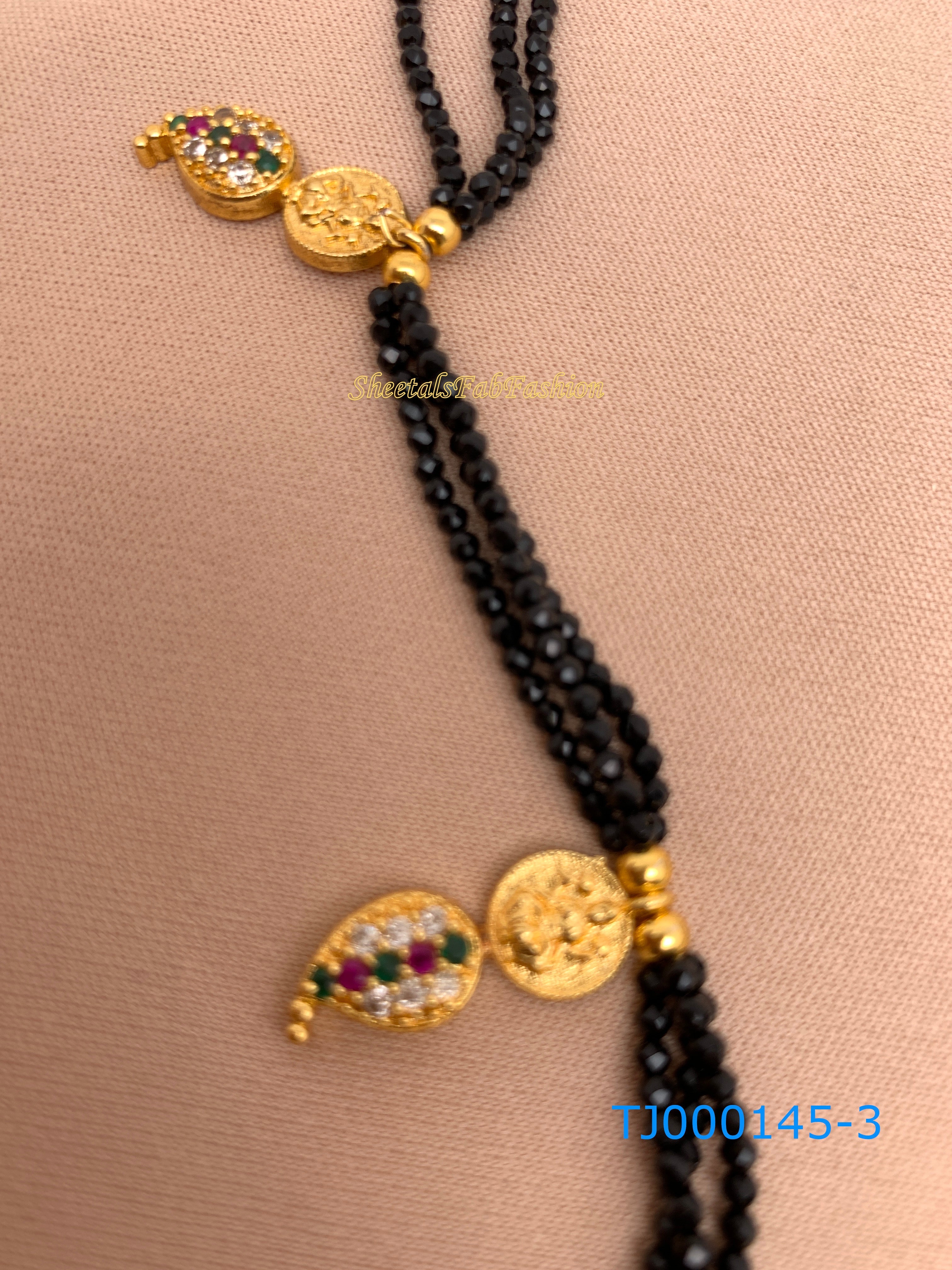 Lakshmi pendant outlet with black beads